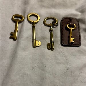 Gold fossil Style Keys bag Tag